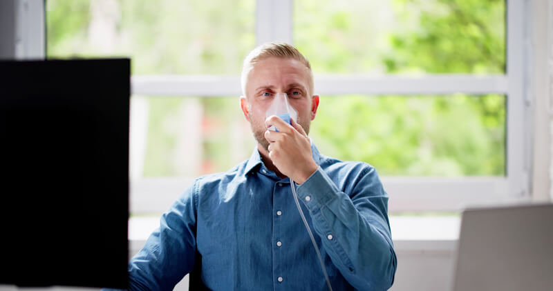 Man using a ventilator