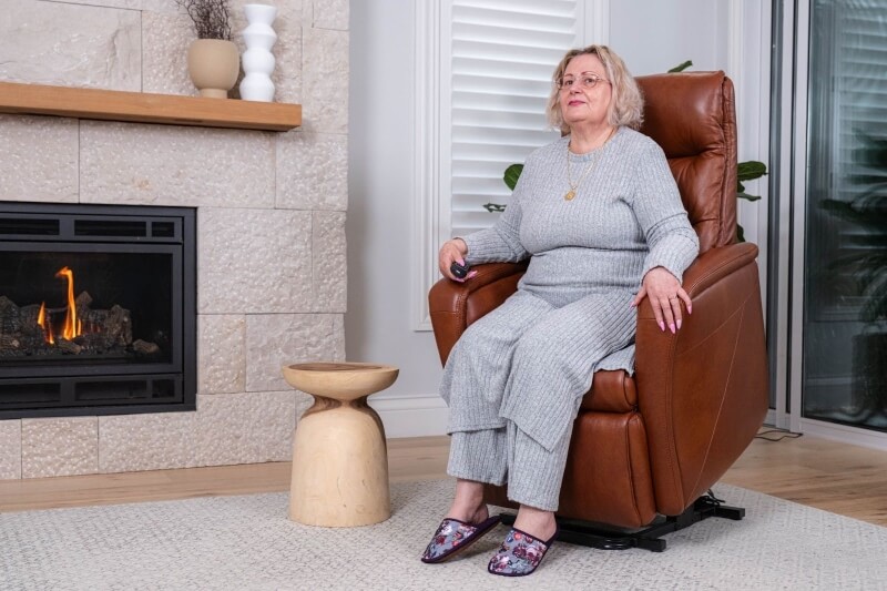 Elder lady sitting in armchair