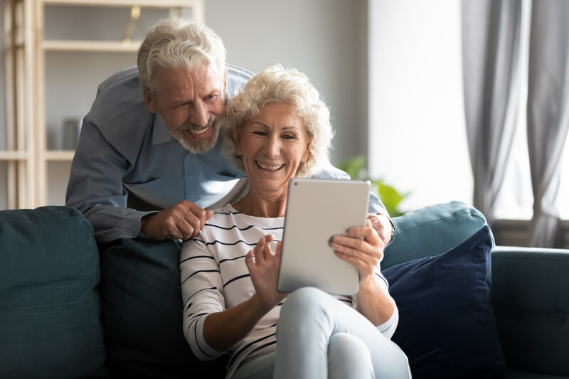 older couple looking at tablet